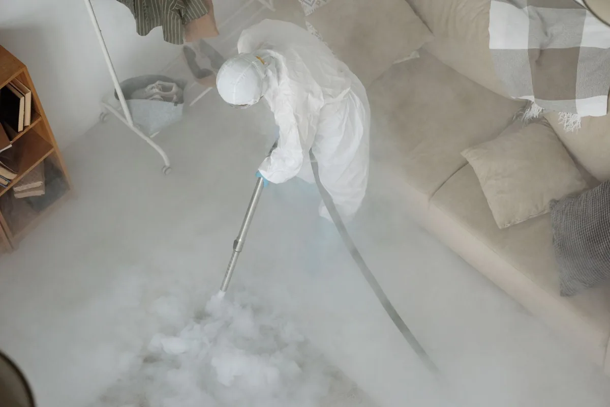 Biohazard cleanup technician in protective equipment, Homer, LA